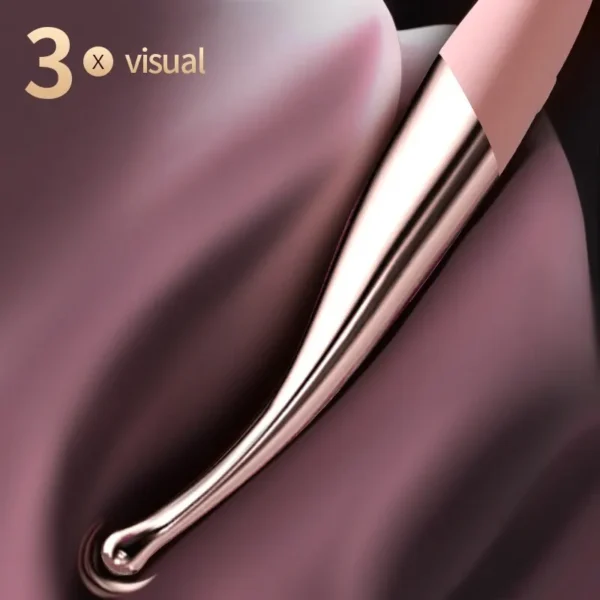 Zoom visuel 3D du sextoy rose et doré sur un fond organique, mise en valeur de l’extrémité
